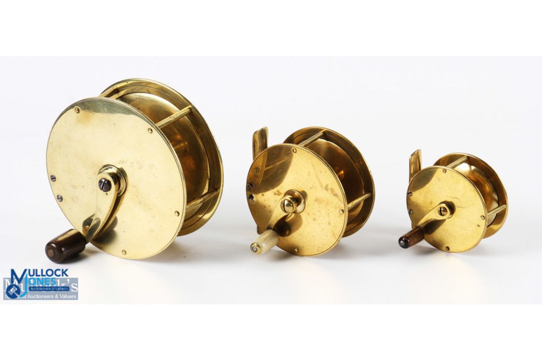 Unnamed brass crank wind reel 2.5" spool with horn handle on curved crank arm, 5 pillar frame; - Image 1 of 2