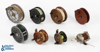 A collection of 8x unnamed reels in wood, plastic, alloy and brass (8)