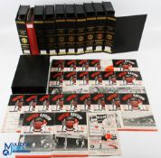 Collection of Manchester United programmes, each season contained in official black holders with