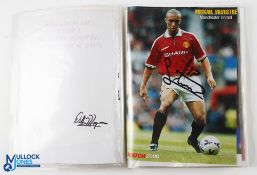Manchester United folder containing magazine photos of United players with signed autographs to