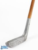 J Randall of Sundridge Park Kent patent elongated alloy mallet head putter with circular lead