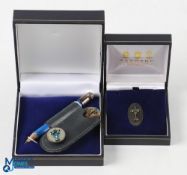 2003 PGA Cup Matches Silver Golf Set (2) - Garrard London Oval Silver Pin Badge in maker's case; and
