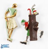 2x Ladies Golfing Brooches - art nouveau metal and enamel lady golfer and a metal caddy figure