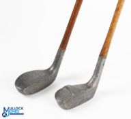 The Huntley alloy mallet head putter with well rounded sole and fitted with a repaired thumb grooved