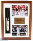 2005 England Ashes Cricket Display, with a signed miniature cricket bat, and photographs, the bat is