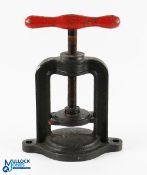 Vic. cast-iron gutty golf ball press - horseshoe shaped mounted on a circular base retaining much of