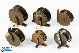 Interesting collection of crank wind brass reels, as follows: Farlows raised check 2.75