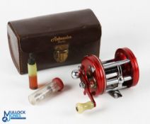 ABU Ambassadeur 6000 multiplier reel in red finish, no number to foot, with star drag, counter