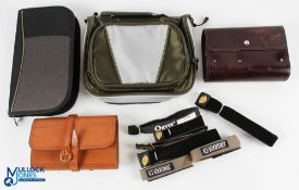 A collection of fly fishing equipment cases, as follows: Leather wallet with twin cover pockets,