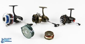 A collection of reels as follows: Mitchell 306 salt water fixed spool spinning reel, with 4 spools