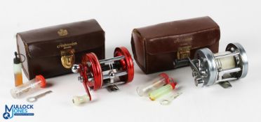 ABU Ambassadeur 6000 and 6500C multiplier reels (2) the 6000 in red finish, no foot number, star