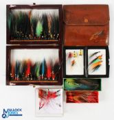 Collection of 35 Norway pattern tubed salmon flies with brass, silver and red cone heads, many