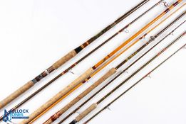 A collection of spinning rods, as follows: Abu Sweden Atlantic 453 Zoom rod 9' 6