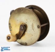 J McGowen London brass crank wind reel with raised check housing, 3.25