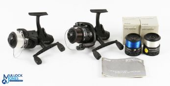 A pair of Fox Stratos FS 7000E fixed spool reels, both with boxed spare spools, both with good bails