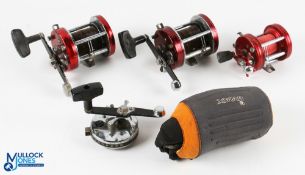 A collection of Abu Ambassadeur reels and covers, as follows: 2x 7000 large counter balance