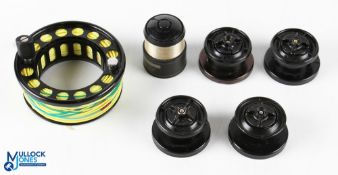 A collection of reel spools, made up of: Loop/Danielsson 9/13 spool. 4x Mitchell spools. Shimano