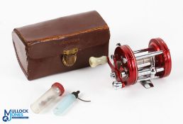 ABU Ambassadeur 6000 Multiplier Reel in red with counterbalance handle, sliding line guide, with