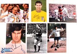 Six Leeds United Football Club hand signed photographs including Jack Charlton, Norman Hunter x2,