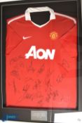 Manchester United FC 2010-2011 home football shirt signed by nineteen including Dimitar Berbatov,