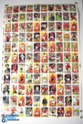 Two uncut printer's sheets of football cards. One with all Manchester United players, the other