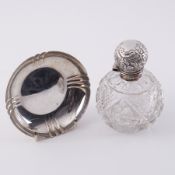 A silver dish, stamped to base 'Payne & Son, Oxford', hallmarked London, 94.84gm and a cut glass