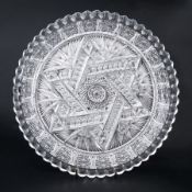 A cut crystal glass dish, circa 1930's decorated with the Star of David decoration, diameter 29cm.