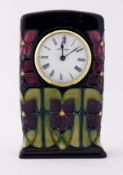 Moorcroft, a modern Moorcroft table clock, height 16cm.