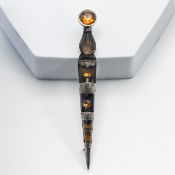 A Scottish Dirk brooch (pin missing).
