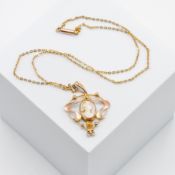 An 9ct yellow gold Art Nouveau design cameo pendant on a 16