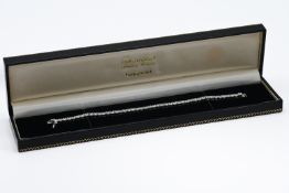 A fine 18ct white gold diamond tennis bracelet, approx 8.67ct, with 45 diamonds, length 18.5cm.