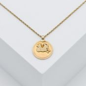 A 9ct yellow gold zodiac pendant 'Aries' on an 18