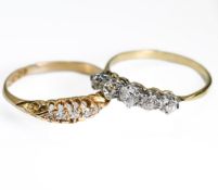 An antique 18ct yellow & white gold ring set with five graduated old cut diamonds, total approx.