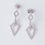 A pair of 18ct white gold diamond shaped drop earrings set with round brilliant cut diamonds