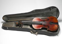 A cased Violin, paper label inside instrument, marked, John Baptise Vuillaume, case marked Paris,