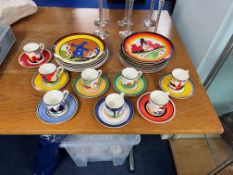 Wedgwood Clarice Cliff cups and saucers including 'May Avenue, Windmill, Blue Firs' (8) together