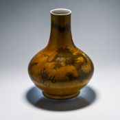 An Amber glazed Korean vase, late Joseon Dynasty, 19th century. The compressed globular body on a
