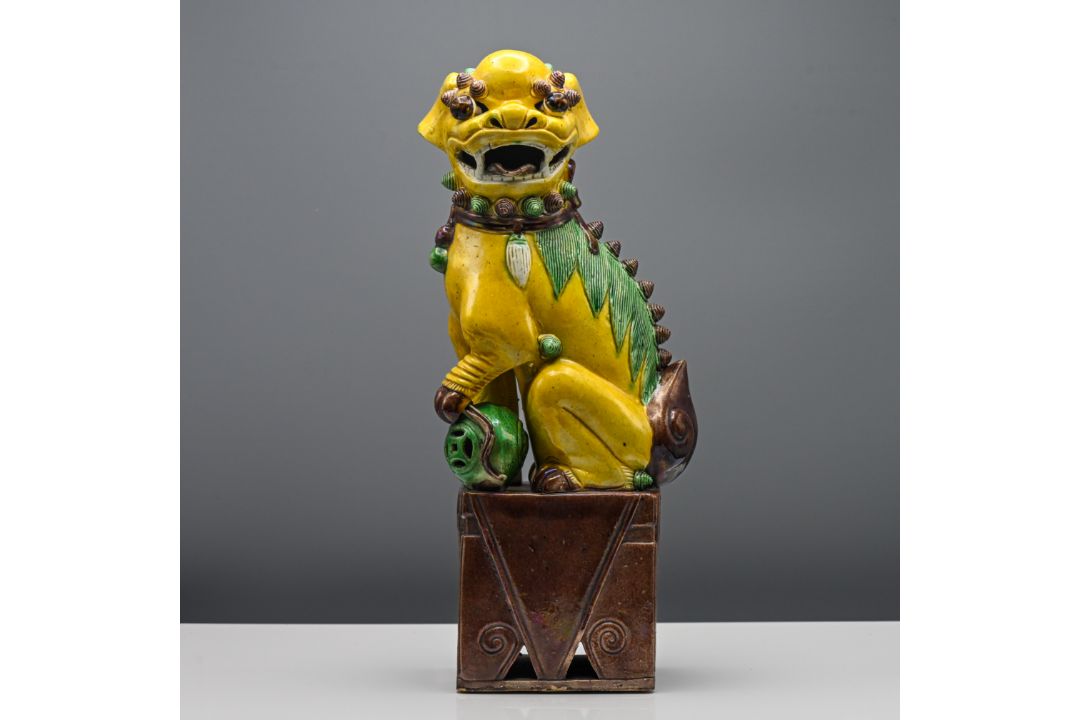 A sancai ‘tile works’ model of a Buddhist Lion, Qing dynasty, 19th century Modelled crouching on a - Image 1 of 8