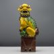 A sancai ‘tile works’ model of a Buddhist Lion, Qing dynasty, 19th century Modelled crouching on a - Image 1 of 8