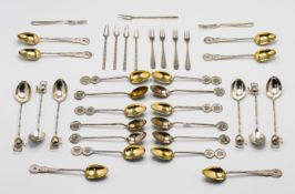 Four sets of six Chinese silver tea spoons, 20th century, each with handles in the form of bamboo