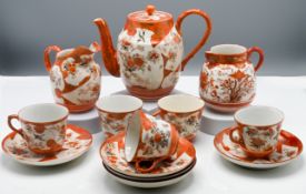 A Japanese Kutani ware coffee set, Meiji period or later. Decorated with over-lapping shaped