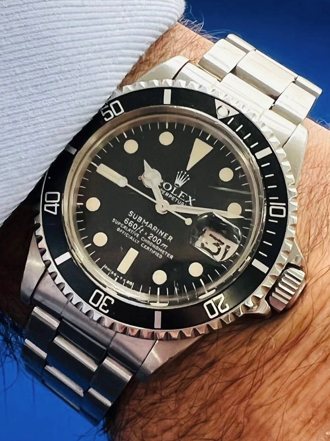 Rolex, a gents steel Oyster Perpetual date Submariner wristwatch, 660ft/200m model, Swiss-T<25 dial,