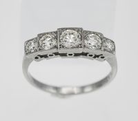 A five stone diamond ring set in platinum, approx. diamond size 0.80ct in total, size N.