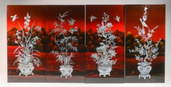 A 20th Century Oriental dragon picture, framed and glazed in a presentation case together with a set