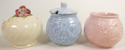 Royal Staffordshire Ceramics Clarice Cliff floral lidded pot, together with 2 similar Sylvac items(