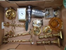 A collection of Metal ware items to include brass candle sticks, Silver plated sugar shaker,