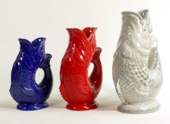 Wade graduated Gluggle jugs, tallest with hand written text to base, height 26.5cm. These items were