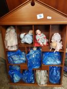 A collection of Yolanders Picture Perfect Babies pottery headed dolls, 10th Anniversary set with