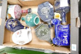 A collection of Wade Ceramic Whiskey & Spirit Bottles /decanters to include Glenfiddich , highland
