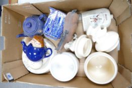 A collection of Wade Ceramic items to include Tetley Tea Folk , Bells Whiskey Decanter, Big Bad Wolf